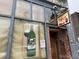 Charming storefront entrance with vintage signage and decorative window display at 1050 N Corona St # 316, Denver, CO 80218