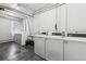 On-site community laundry facility with multiple commercial grade washers and dryers at 1050 N Corona St # 316, Denver, CO 80218
