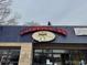 Exterior view of Snarfburger restaurant, featuring its logo and entrance at 1050 N Corona St # 316, Denver, CO 80218