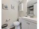 Clean bathroom with white vanity and linen closet at 2630 S Xanadu Way # C, Aurora, CO 80014