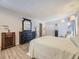 Primary bedroom with walk-in closet and dresser at 2630 S Xanadu Way # C, Aurora, CO 80014