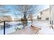 Deck overlooking backyard with seating area at 6990 Orchard Ct, Arvada, CO 80007