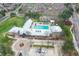 Aerial view of the neighborhood pool with ample parking and landscaping at 12606 S Sopris Creek Dr, Parker, CO 80134