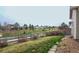 A spacious backyard with lush lawn, mature trees, and a fence at 12606 S Sopris Creek Dr, Parker, CO 80134