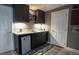 A cozy bar area with a mini fridge, perfect for entertaining at 12606 S Sopris Creek Dr, Parker, CO 80134
