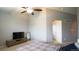 A peaceful bedroom offers great natural lighting and an open closet at 12606 S Sopris Creek Dr, Parker, CO 80134