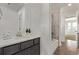Modern bathroom vanity with gray cabinets, a white countertop, and tile flooring at 14769 Dahlia St, Thornton, CO 80602