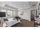 Bedroom boasts bright natural light, tray ceiling, and plush carpet flooring at 14769 Dahlia St, Thornton, CO 80602