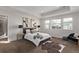 Bedroom boasts bright natural light, tray ceiling, and plush carpet flooring at 14769 Dahlia St, Thornton, CO 80602