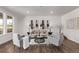 Comfortable living room featuring hardwood floors, recessed lights, neutral decor, and plenty of seating at 14769 Dahlia St, Thornton, CO 80602