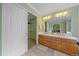 Bathroom with double vanity, walk-in shower, and large closet at 13471 Cascade St, Broomfield, CO 80020