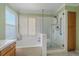 Bathroom featuring garden tub and separate shower at 13471 Cascade St, Broomfield, CO 80020