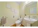 Updated bathroom with pedestal sink and modern fixtures at 13471 Cascade St, Broomfield, CO 80020