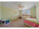 Charming bedroom with a bed, play area, and window seat at 13471 Cascade St, Broomfield, CO 80020