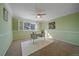 Bright bedroom with carpeted floors and a desk at 13471 Cascade St, Broomfield, CO 80020