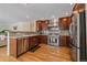 Modern kitchen with stainless steel appliances and granite countertops at 13471 Cascade St, Broomfield, CO 80020