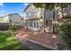 Brick patio with seating area and landscaping at 13471 Cascade St, Broomfield, CO 80020