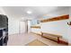 Functional basement entry with storage and bench at 7722 W 1St Pl, Lakewood, CO 80226