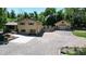 Ranch-style home with attached garage and landscaping at 7722 W 1St Pl, Lakewood, CO 80226
