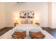Bright bedroom featuring modern decor and concrete floors in a converted industrial space at 1777 E 39Th Ave # 209, Denver, CO 80205