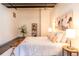 Bright bedroom featuring modern decor and concrete floors and in an industrial space at 1777 E 39Th Ave # 209, Denver, CO 80205