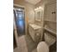 Bathroom featuring granite vanity top, storage, and modern finishes at 10001 E Evans Ave # D, Aurora, CO 80247