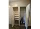 Open closet featuring shelving and rod system for storage at 10001 E Evans Ave # D, Aurora, CO 80247
