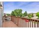 Wooden deck view showcasing the street and neighborhood at 10001 E Evans Ave # D, Aurora, CO 80247