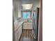 Bright kitchen features stainless steel appliances, granite countertops and wood flooring at 10001 E Evans Ave # D, Aurora, CO 80247
