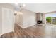 Spacious living room with stone fireplace and balcony access at 10001 E Evans Ave # D, Aurora, CO 80247