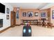 Recreation room featuring a bowling alley, sports memorabilia, and custom seating at 5650 E Stanford Dr, Cherry Hills Village, CO 80111