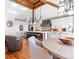 Bright kitchen with a large island, stainless steel appliances, and breakfast nook at 5650 E Stanford Dr, Cherry Hills Village, CO 80111