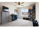 Bright bedroom featuring a large window, spacious layout, and ample storage solutions at 5998 Berry Ridge Way, Castle Rock, CO 80104