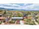 Charming home featuring a lovely front yard, mature trees, and mountain views at 4655 Ludlow St, Boulder, CO 80305