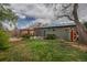 Expansive backyard with a charming pergola, shed and lush greenery for outdoor enjoyment at 4655 Ludlow St, Boulder, CO 80305