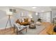 Finished basement with modern furniture, wood-look floors and good lighting at 4655 Ludlow St, Boulder, CO 80305