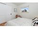 Inviting bedroom with a serene atmosphere, accentuated by soft light and comfortable furnishings at 4655 Ludlow St, Boulder, CO 80305