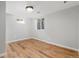 Empty bedroom with light walls and wood floors at 4655 Ludlow St, Boulder, CO 80305