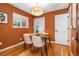 Inviting dining room with warm lighting, a modern chandelier, and a window that offers natural light at 4655 Ludlow St, Boulder, CO 80305