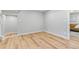 Empty living room with light walls and wood floors at 4655 Ludlow St, Boulder, CO 80305