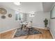 Bright home office featuring a modern desk, light walls and wood flooring at 4655 Ludlow St, Boulder, CO 80305