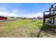 Expansive backyard with a well-maintained lawn, outbuildings, and picturesque views at 2190 Helen Ct, Parker, CO 80138