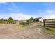 Gated driveway leads to a private residence and barn at 2190 Helen Ct, Parker, CO 80138