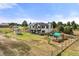 Charming two-story home featuring a spacious yard with a shed and playground at 2190 Helen Ct, Parker, CO 80138