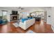 Open living area with hardwood floors and fireplace provides a comfy place to relax at 2190 Helen Ct, Parker, CO 80138