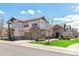 Beautiful two-story home featuring stone accents, a two-car garage, and well-manicured lawn at 23110 York Ave, Parker, CO 80138
