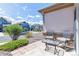 Inviting front porch with seating area, beautiful landscaping, and street view at 23110 York Ave, Parker, CO 80138