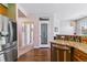 Spacious kitchen featuring stainless steel appliances, wood floors, and a pantry at 23110 York Ave, Parker, CO 80138