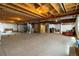 Spacious unfinished basement with exposed ceiling, ready for customization and future expansion at 2724 Rising Moon Way, Castle Rock, CO 80109
