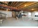 Large unfinished basement with high ceilings, offering endless possibilities for future living space at 2724 Rising Moon Way, Castle Rock, CO 80109